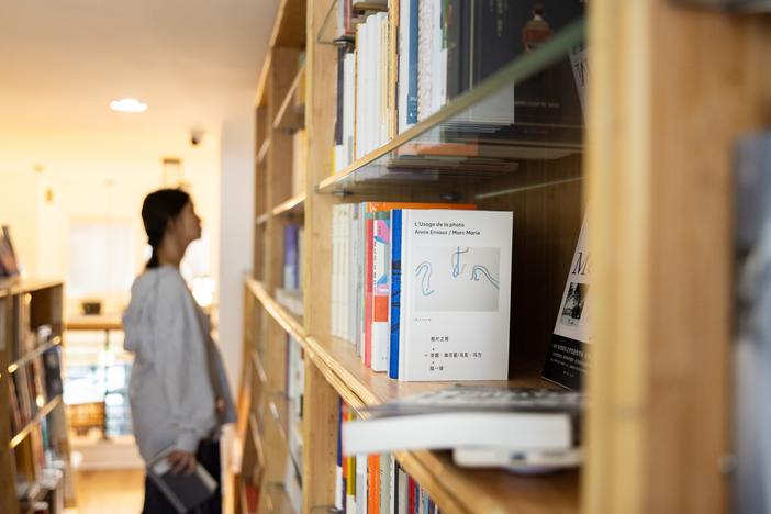 A customer browses titles at JF Books on September 17, 2024.