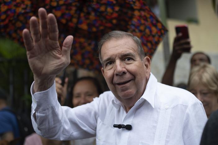 Venezuelan opposition presidential candidate Edmundo Gonzalez waves to supporters during a political event at a square in the Hatillo municipality of Caracas, Venezuela, June 19, 2024.