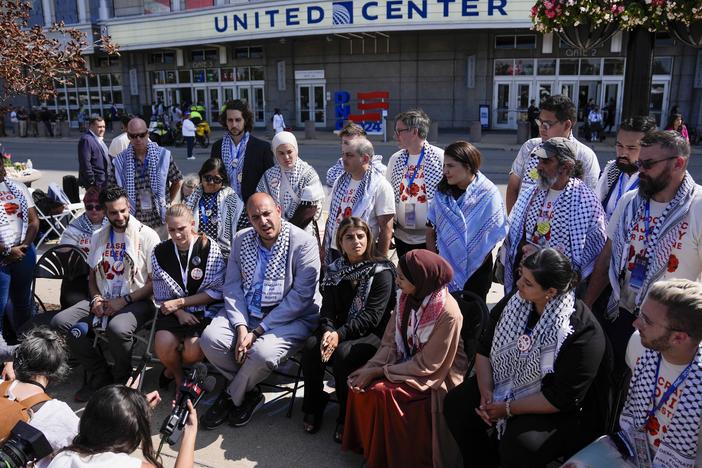 Uncommitted delegates hold a press conference outside the United Center before the Democratic National Convention on Aug. 22 in Chicago. 