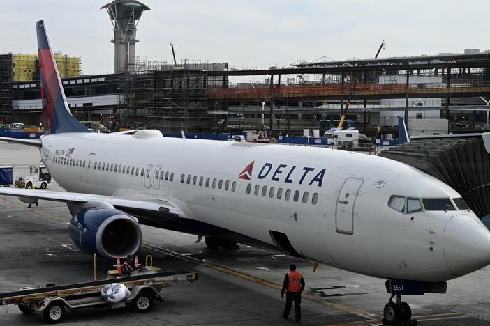 A Delta Air Lines plane is seen at Los Angeles International Airport on Jan. 11, 2023. Earlier this week, a cabin pressurization issue aboard a Delta flight caused a number of passengers to bleed from the nose and ears.