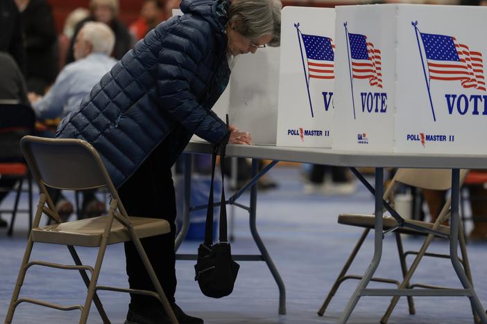 A voter fills out their New Hampshire presidential primary ballot at a polling location in Bedford on Jan. 23.