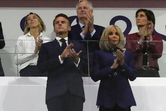 French Prime Minister Michel Barnier, background center, French President Emmanuel Macron, foreground left, and Macron's wife, Brigitte Macron, foreground right, applaud during the closing ceremony of the 2024 Paralympics on Sept. 8 in Paris.
