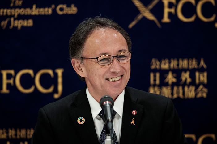 Okinawa Governor Denny Tamaki smiles during a press conference in Tokyo on March 1, 2019, after a vote on the relocation of a U.S. base on the island on Feb. 25.