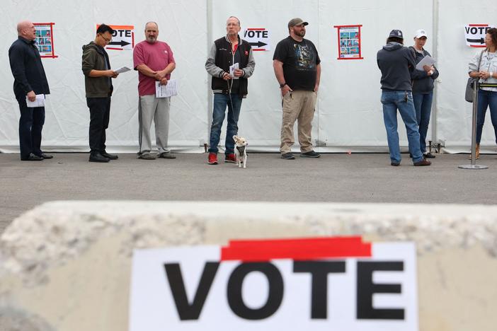 Voters wait in line at a Las Vegas polling place on Nov. 8, 2022. Voters in Nevada — and several other states — may enact big changes to their election systems.