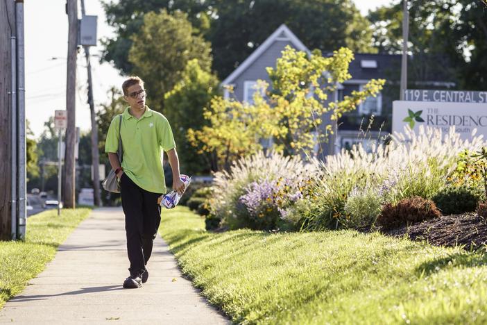 Jason Mazzola walks to work at The Residence at Natick South, an LCB Senior Living community in Natick, MA. August 22, 2024.<br>