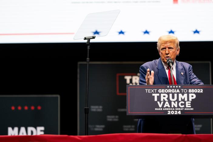 Former President Donald Trump speaks to attendees during a campaign rally at the Johnny Mercer Theatre in Savannah, Ga., on Tuesday. 