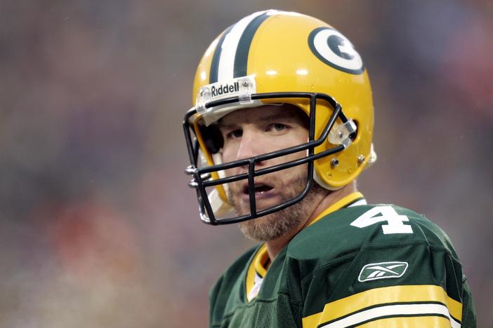 Former NFL all-star quarterback Brett Favre says he has Parkinson's disease. Favre played 20 seasons in the NFL, mostly with the Green Bay Packers. He retired in 2011. Favre won the Super Bowl and was a three-time NFL MVP. He also had his share of concussions and said he had often had memory loss.