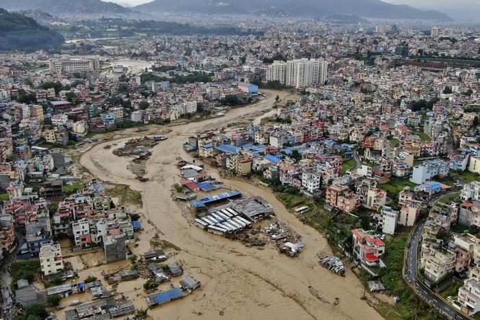 In this aerial image of the Kathmandu valley, Bagmati River is seen flooded due to heavy rains in Kathmandu, Nepal, Saturday, Sept. 28, 2024.