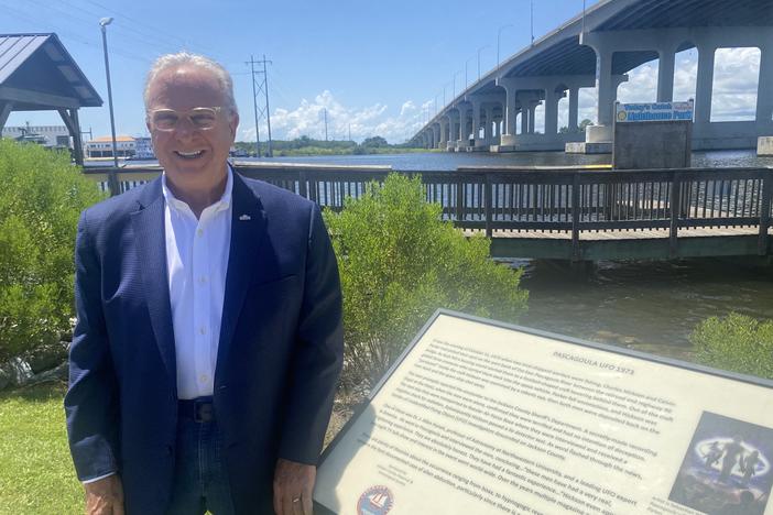 Pascagoula Mayor Jay Willis stands next to a historical marker that claims aliens came from outer space and abducted two local men in 1973. 