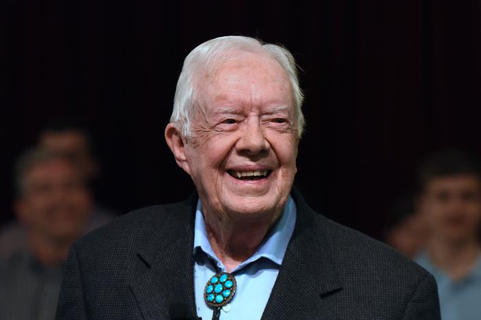 Former President Jimmy Carter speaks to the congregation at Maranatha Baptist Church before teaching Sunday school in his hometown of Plains, Ga., in April 2019. He taught Sunday school at the church on a regular basis after leaving the White House in 1981, drawing hundreds of visitors who would arrive hours early to get a seat.
