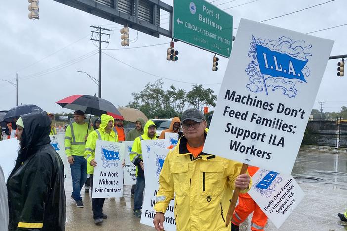 Workers walk the picket line outside Dundalk Marine Terminal at the Port of Baltimore on October 1, 2024.