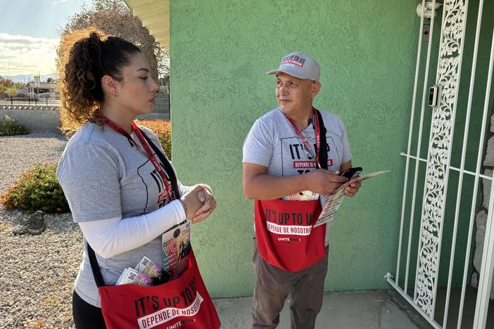 Nancy Chavez Florez and Mauricio Baena, a kitchen worker and food runner, are members of the Culinary Workers Union. They have been knocking on doors in Latino and minority neighborhoods in Las Vegas in support of Vice President Kamala Harris. <br>