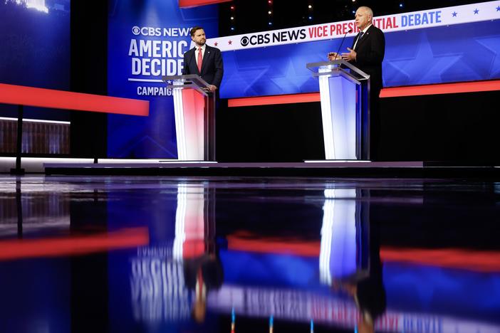 Republican vice presidential candidate Sen. JD Vance and Democratic vice presidential candidate Gov. Tim Walz participate in a debate at the CBS Broadcast Center on Tuesday in New York City.