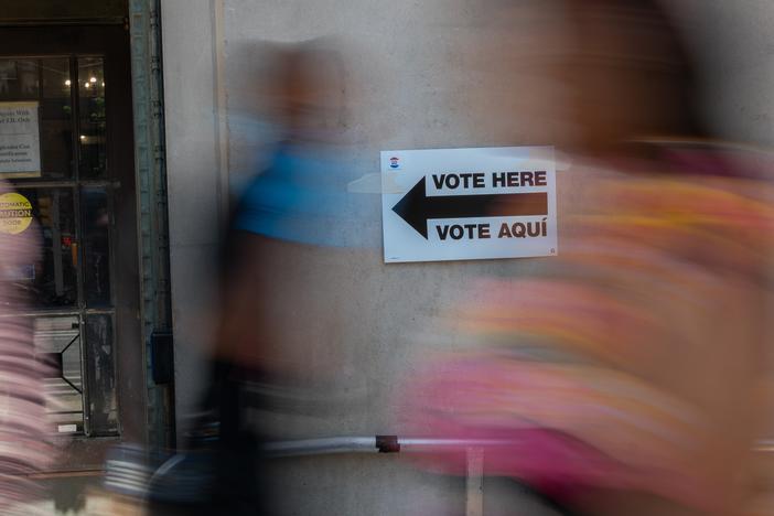 In this file photo, a sign directs people to a voting site in the Bronx during the Democratic primary on June 25 in New York.