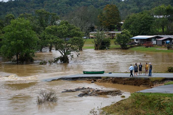 BOONE, NORTH CAROLINA - SEPTEMBER 27: A group of friends canoed the South Fork New River in Boone, North Carolina, looking at the destructions from Hurricane Helene. The death toll from the storm is already over 100 people, but the true number will likely be many times that, according to a new study.