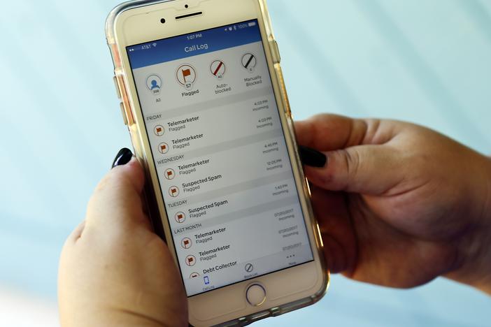 This Aug. 1, 2017, file photo, shows a call log displayed via an AT&T app on a cellphone in Orlando, Fla.