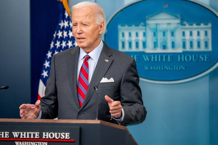 President Biden speaks during a news conference in the Brady Press Briefing Room at the White House on Friday. Biden made a surprise appearance, his first in the briefing room since becoming president, to tout a positive job report and take questions from reporters.