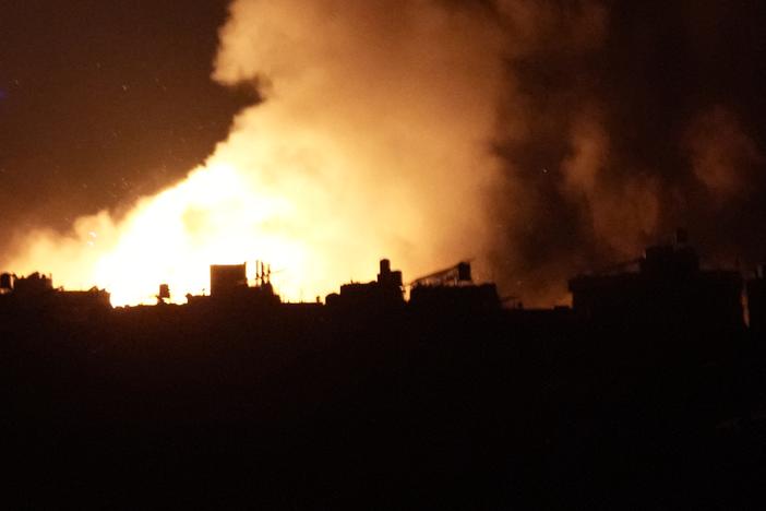 Flames and smoke rise from an Israeli airstrike in Dahiyeh, Beirut, Lebanon, early Sunday, Oct. 6, 2024.