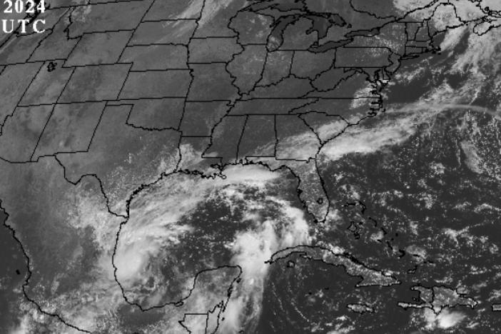 Weather satellite image of the U.S. taken on Saturday afternoon ET shows stormy conditions brewing in the Gulf Coast.