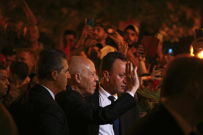 Tunisian president and candidate for re-election Kais Saied joins his supporters after the announcement of the provisional results for the presidential elections, in the capital Tunis, Tunisia, Sunday.