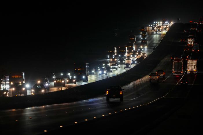 Heavy traffic flows northbound on Interstate 75 as people evacuate the Tampa Bay area ahead of Hurricane Milton's arrival late Monday, Oct. 7, 2024, in Ocala, Fla.