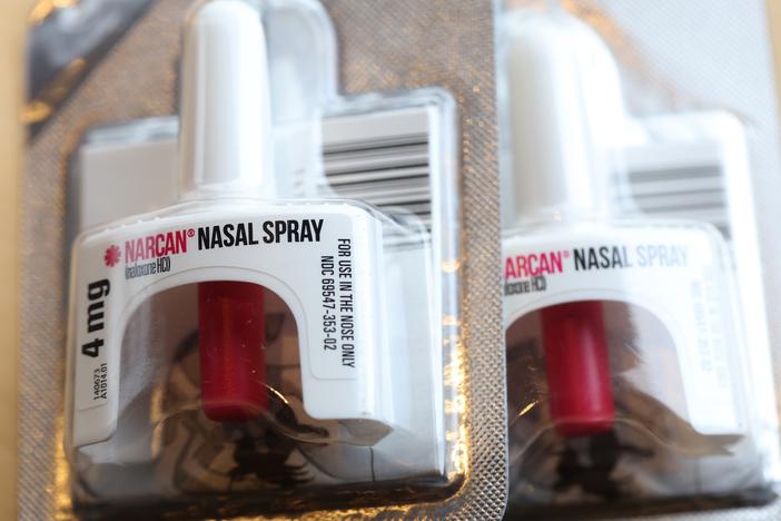 Naloxone, often sold under the brand name Narcan, is seen as a major factor in declining drug overdose deaths.  The White House says more companies are agreeing to make the medication available at work sites, in classrooms and at other locations where drug fatalities occur.