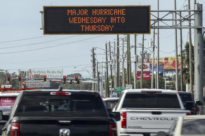 Highway signage announces the impending arrival of Hurricane Milton and the evacuations zones on Tuesday, Oct. 8, 2024, in Port Richey, Fla.