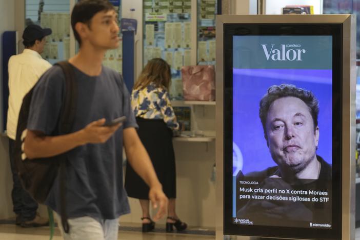 An ad by Valor media shows a photo of Elon Musk at a shopping center in Brasilia, Brazil, on Sept. 2.