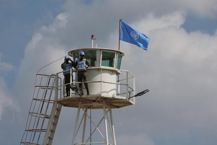 Peacekeepers from the United Nations Interim Force in Lebanon (UNIFIL) man an observation point along what's called the Blue Line on the border between Lebanon and Israel, near the southern Lebanese town of Marwahin, on Oct. 12, 2023.