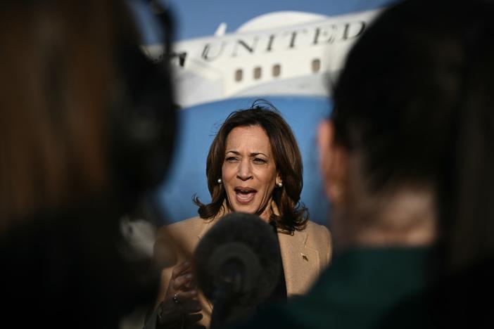 Vice President Harris takes questions from reporters at Joint Base Andrews in Maryland on Oct.12, 2024.