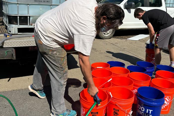 Jerry Cahill has been flushing toilets as a volunteer since his studio in Asheville's River Arts District was destroyed by flooding from the remnants of Helene.