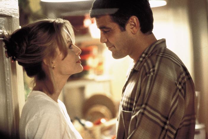 Michelle Pfeiffer and George Clooney play single parents trying to get through a very busy day in New York in <em>One Fine Day.</em>