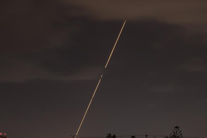Israeli air defense system fires to intercept rockets fired from Iran, Tuesday, Oct. 1, 2024, over Hadera, Israel.