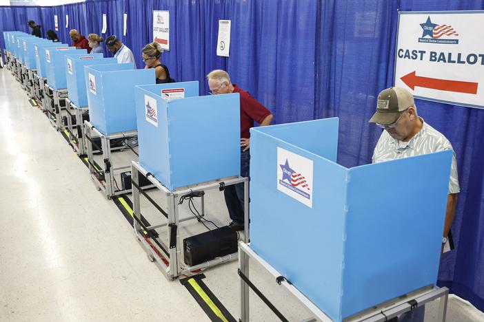 Voters fill out their ballots on the second day of early voting in the 2024 presidential election at the Board of Elections Loop Super Site in Chicago on Oct. 4.