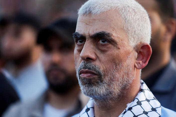 Hamas leader Yahya Sinwar looks on as Palestinian Hamas supporters take part in an anti-Israel rally over tension in Jerusalem's Al-Aqsa Mosque, in Gaza City, Oct. 1, 2022.