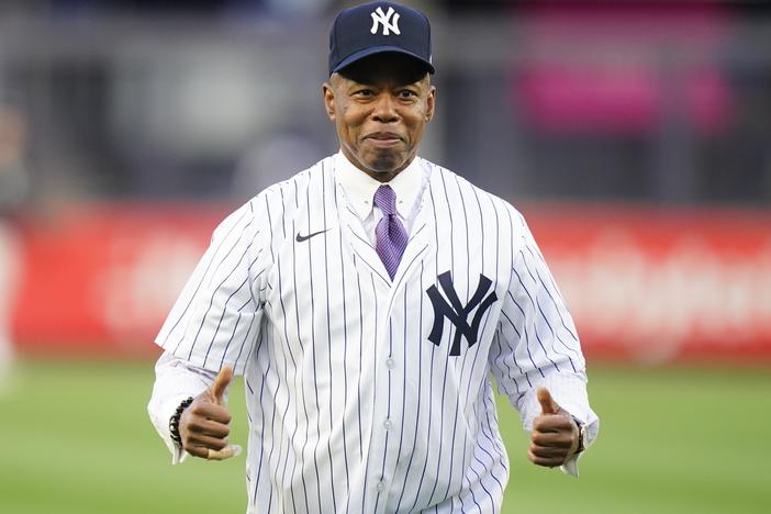 New York City Mayor Eric Adams gestures after throwing out a ceremonial first pitch before a baseball game between the New York Yankees and the Toronto Blue Jays Tuesday, May 10, 2022, in New York.
