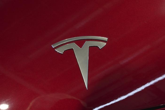 The logo of Tesla car is pictured at the Paris Auto Show, in Paris on Oct. 14, 2024.