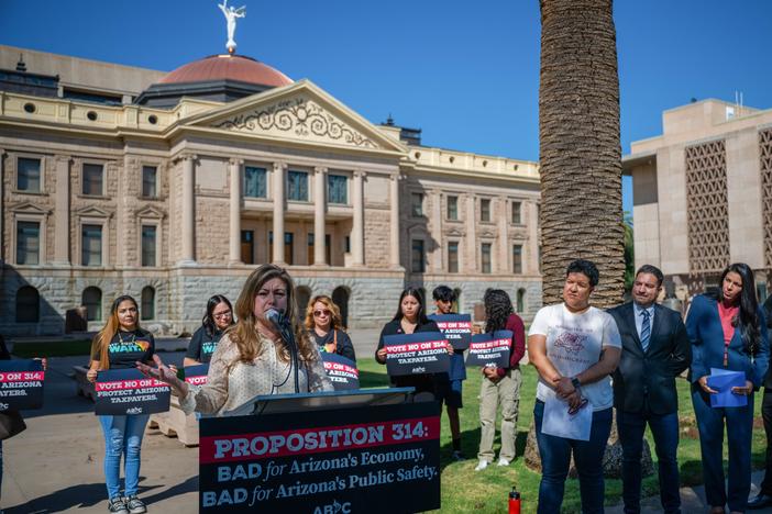 Monica Villalobos joined elected officials, business leaders and educators to speak in opposition to Proposition 314 in Phoenix on Oct. 10, 2024. The ballot measure would require police to perform immigration duties in addition to their regular enforcement duties.