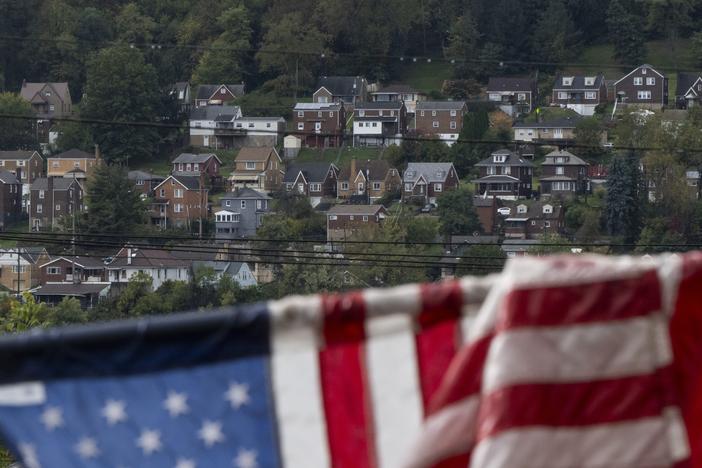 Houses across the Monongahela River are seen from Braddock, Pa., on Oct. 16, 2024.