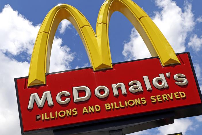 A sign outside a McDonald's restaurant is seen in Pittsburgh, on June 25, 2019. E. coli food poisoning linked to McDonald’s Quarter Pounder hamburgers has sickened at least 49 people in 10 states, including one person who died and 10 who were hospitalized.