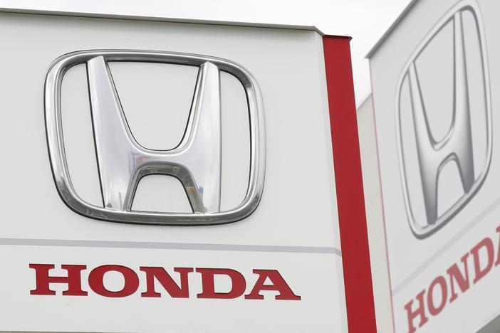 Honda Motor Co. logos are pictured in Tsukuba, northeast of Tokyo, on Feb. 13, 2019. The automaker is recalling more than 700,000 vehicles over fuel pumps that may crack and leak fuel, which could increase the risk of a fire.