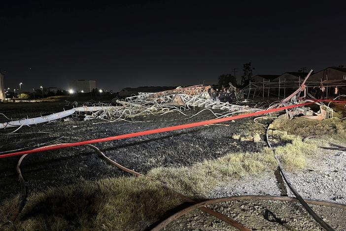 This image provided by the Houston Fire Department shows the scene of a helicopter crash in the city's Second Ward, Sunday, Oct. 20, 2024.