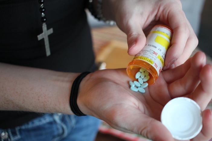 Veronica, 17, of Des Moines, Iowa, with her estrogen pills. A new study shows a very low rate of regret among kids taking puberty blockers or hormones as part of gender-affirming care.