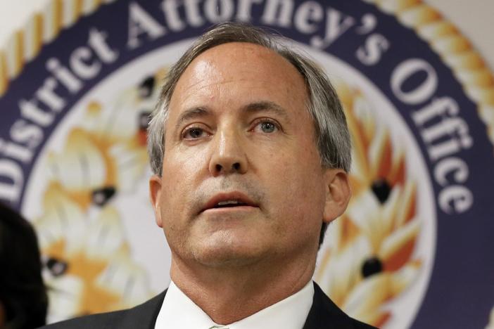 Texas Attorney General Ken Paxton is shown speaking at a news conference in Dallas on June 22, 2017.