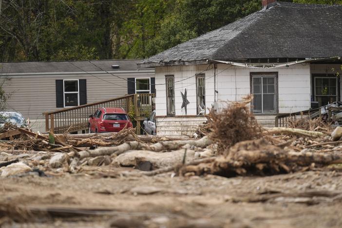 Homes lie in a debris field in the aftermath of Hurricane Helene, Thursday, Oct. 3, 2024, in Pensacola, N.C.