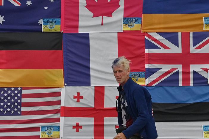 This photograph taken on June 23, 2022 in Ukraine, shows U.S. citizen Ryan Routh sticking up national flags of the countries helping Ukraine. Routh, now 58, faces federal charges on the attempted assassination of former President Donald Trump at his West Palm Beach, Fla. golf course on September 15, 2024.