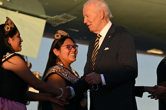 President Biden greets members of a Native American community upon arrival at Phoenix Sky Harbor International Airport on Thursday.