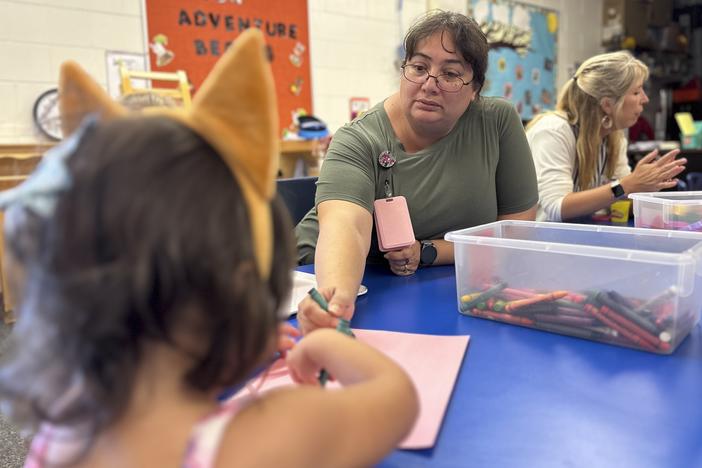 Julie Beck earns roughly $20 an hour teaching in Head Start classrooms 10 months a year. “I'm paycheck to paycheck,” she says.