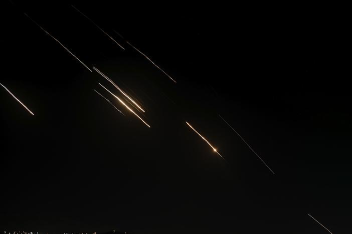 Missiles launched from Iran towards Israel are seen in the West Bank city of Nablus Tuesday, Oct. 1, 2024.