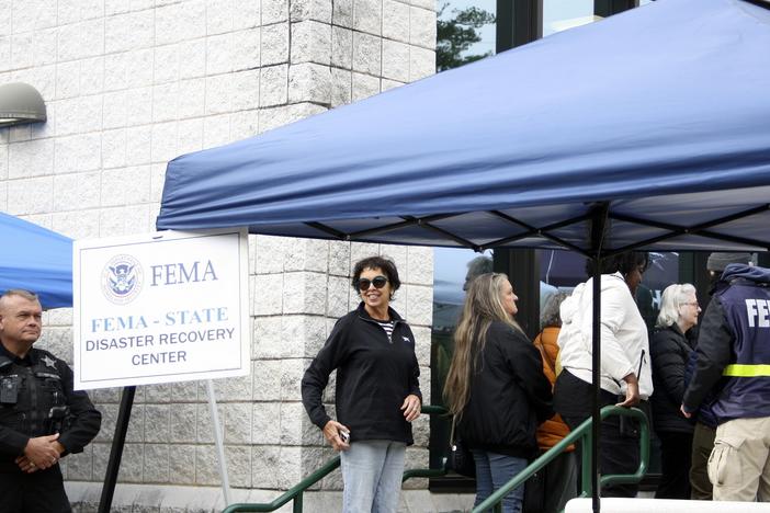 People gather at a FEMA Disaster Recovery Center at A.C. Reynolds High School in Asheville, N.C.,, Tuesday, Oct. 15, 2024.